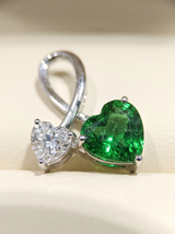 Amore Verde Twin Heart Pendant  DESCRIPTION: A beautiful expression of love